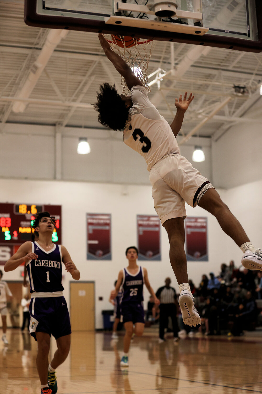 Noah Lewis dunks for two of his team-high 18 in Seaforth’s win over Carrboro.